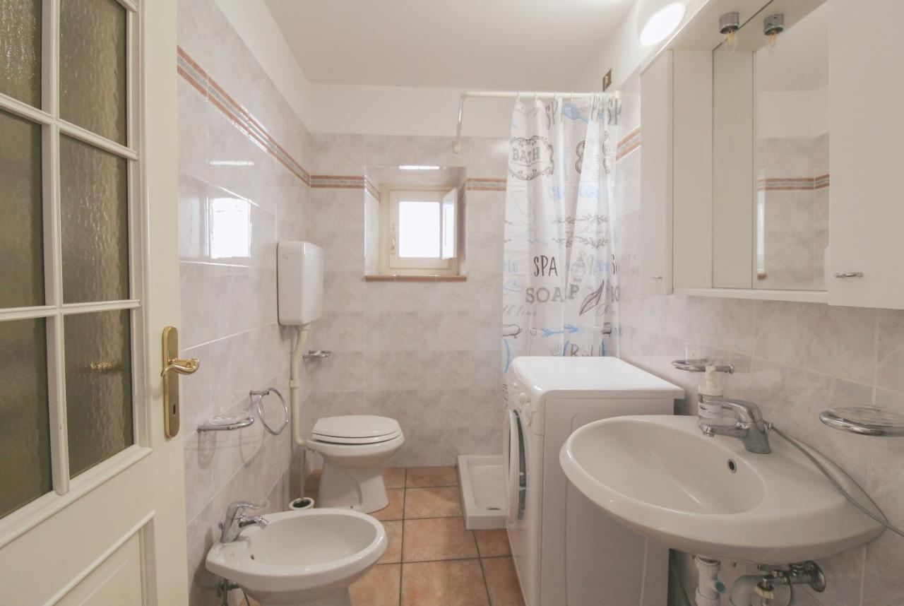 דירות דומאסו La Casa Del Porto מראה חיצוני תמונה